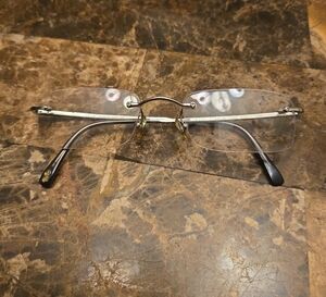 Ray-Ban Titanium Silver Glasses.Ray Ban RB 8501 1000 Titanio Rimless Gunmetal
